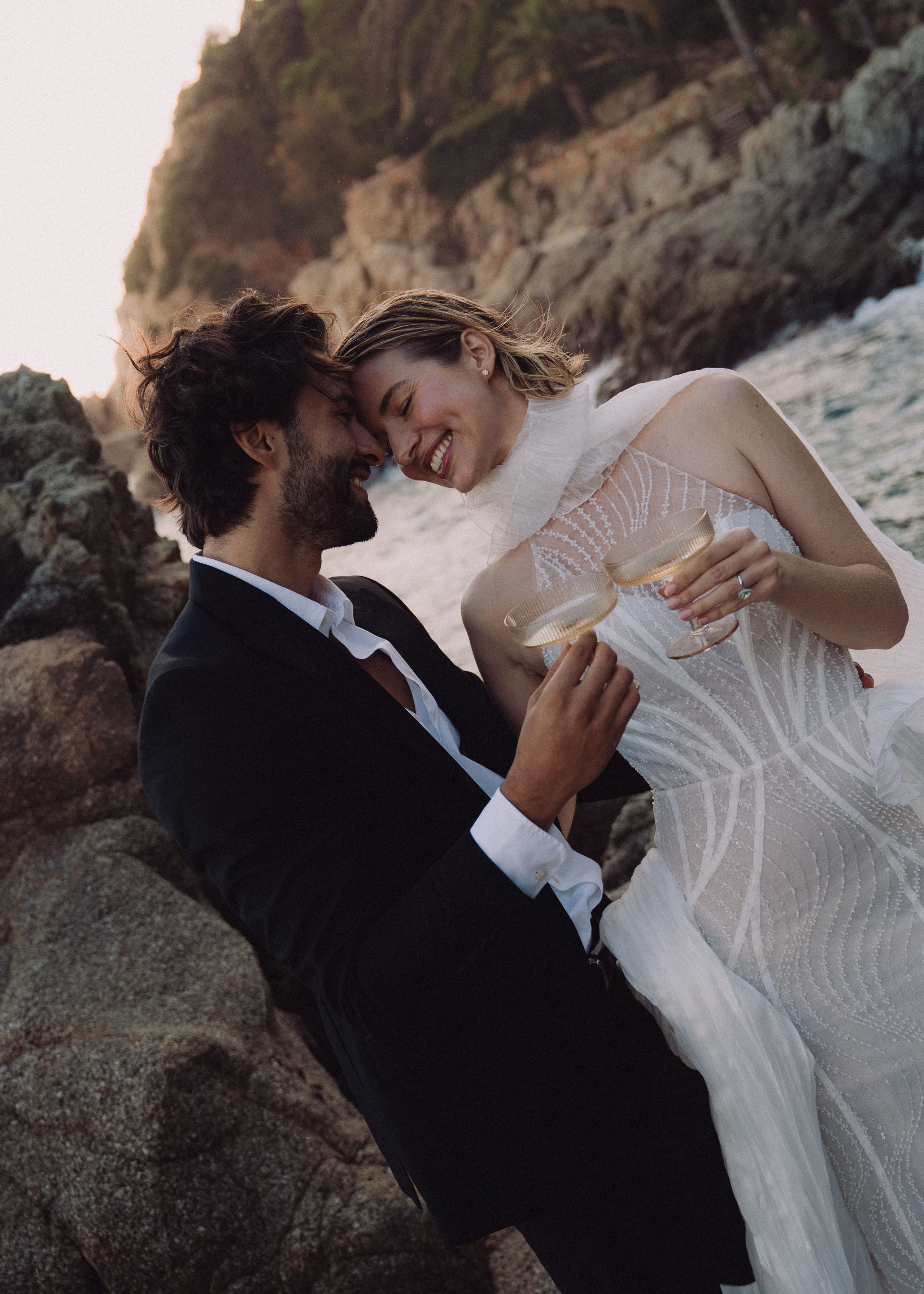 A shared laugh, framed by the rocks.