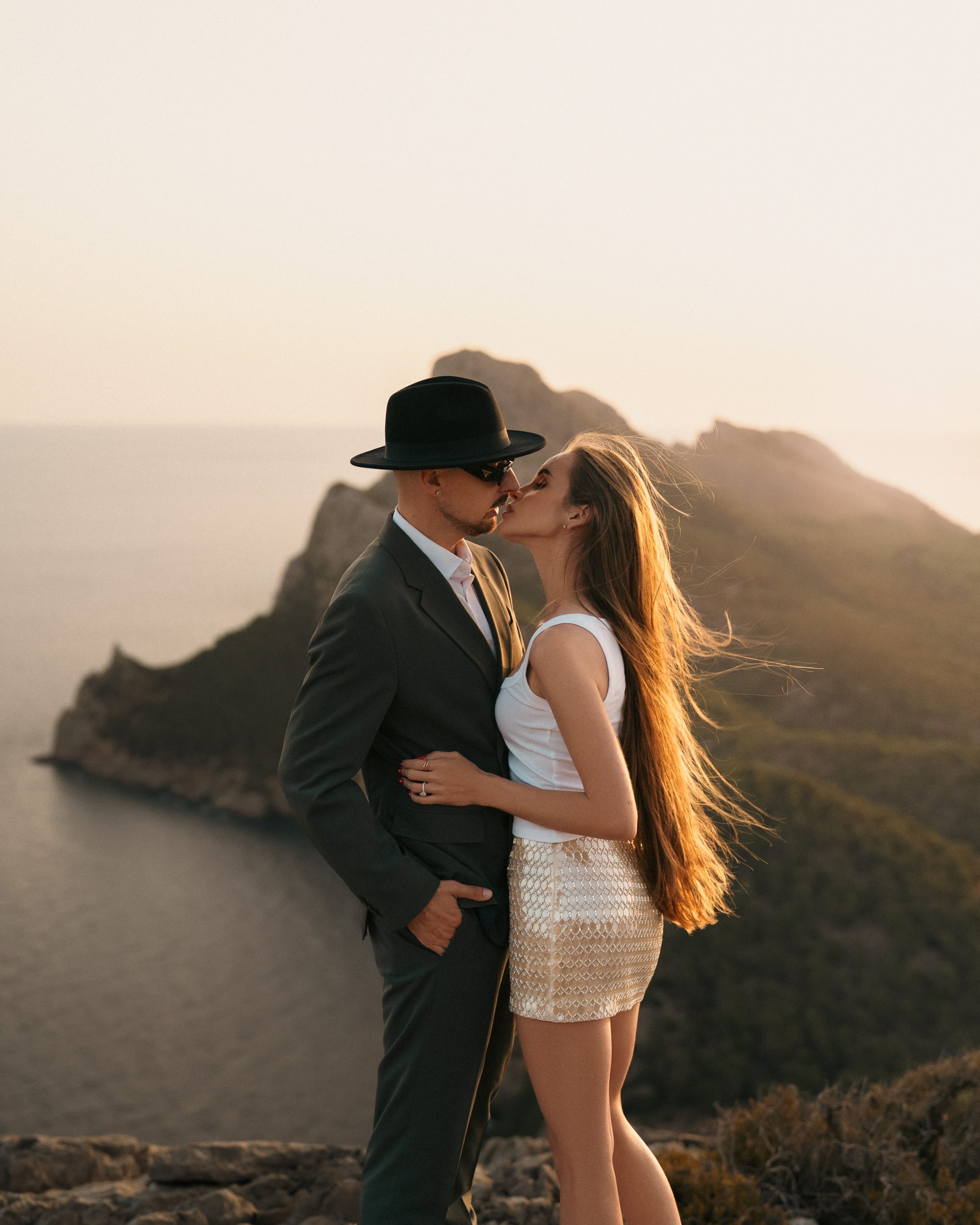 A kiss above the coast in the evening light.
