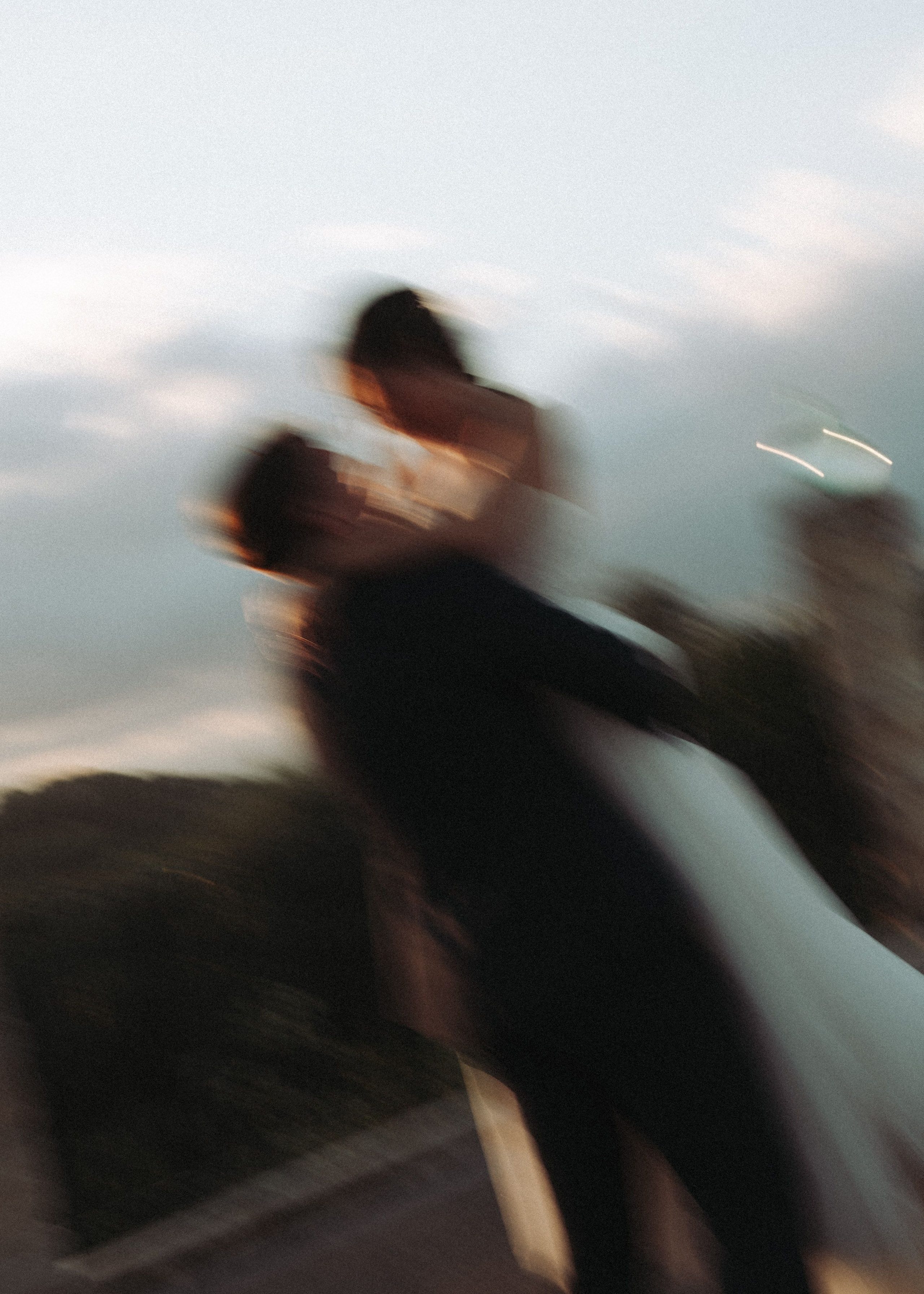 A couple's portrait with a soft blur of movement.