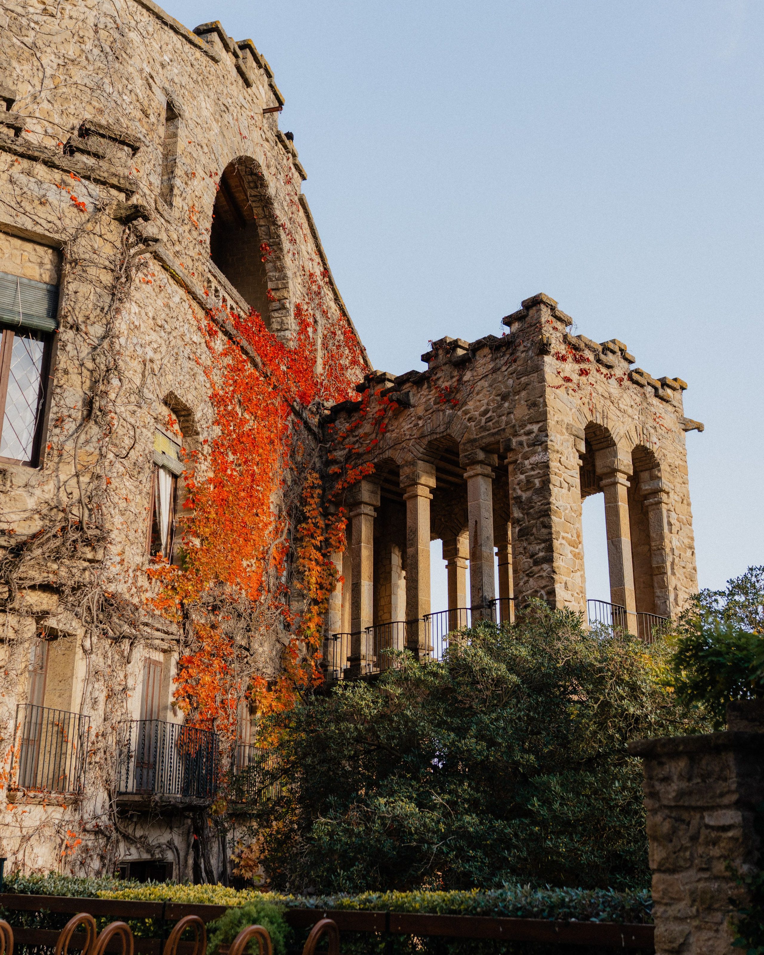 Old stone arches and leaves in autumn colours.